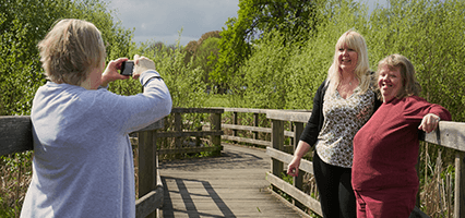 Juanita taking a photo of Lynsey and Michelle