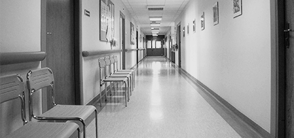 Black and white picture of a assessment and treatment unit corridor