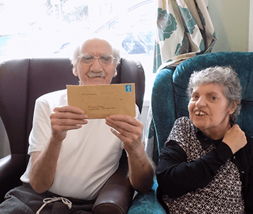 Photo of Michael and Susan with their letter