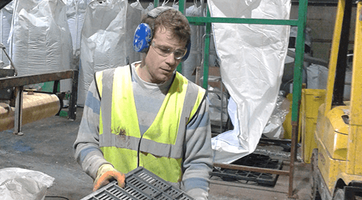 Mark working at plastics recycling firm