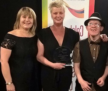 Sue pictured with her Award alongside Fred